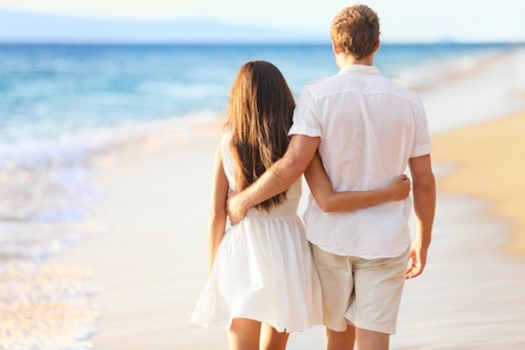 Vacation Couple Walking on Beach